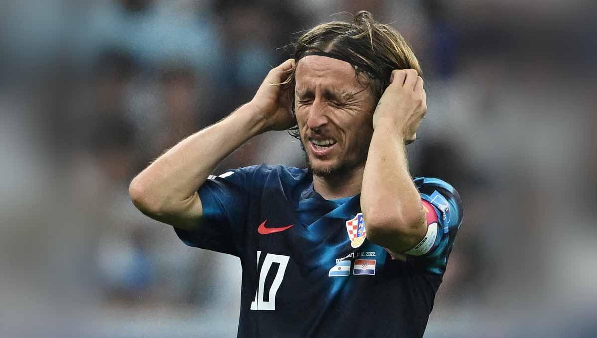 Luka Modric dari Kroasia usai pertandingan saat Kroasia tersingkir dari Piala Dunia Qatar 2022. (Foto: REUTERS/Dylan Martinez) - INDOSPORT