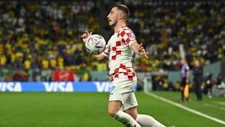 Pemain Timnas Kroasia di Piala Dunia 2022, Josip Juranovic. Foto:  REUTERS/Dylan Martinez.