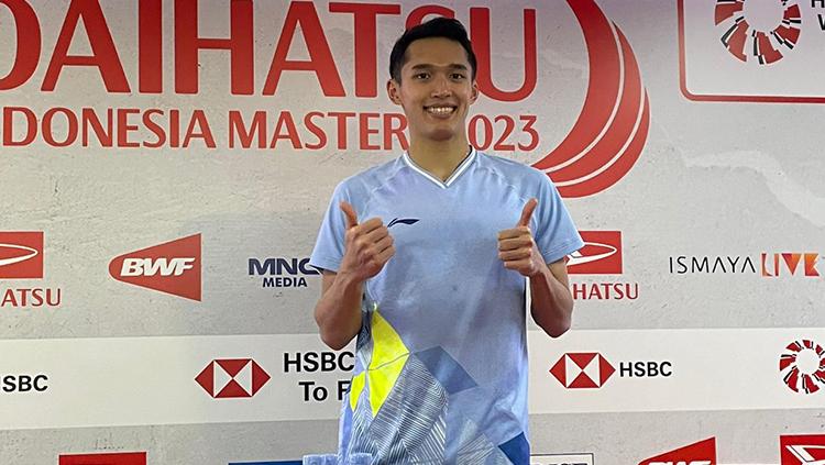 Jonatan Christie saat meladeni wawancara dengan media usai pertandingan perempatfinal Indonesia Masters 2023. - INDOSPORT