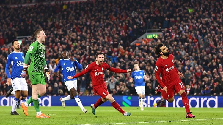 Mohamed Salah merayakan golnya di laga Liverpool vs Everton di Liga Inggris (14/02/23). (Foto: REUTERS/Carl Recine)