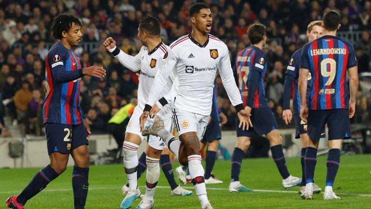 Marcus Rashford dari Manchester United merayakan gol ke gawang FC Barcelona di Liga Europa. REUTERS-Albert Gea - INDOSPORT