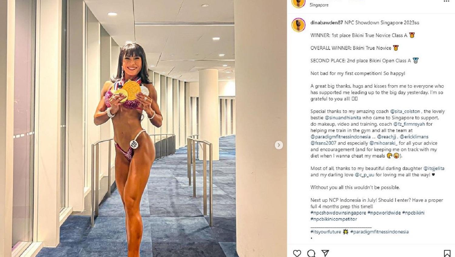 Kabar bahagia datang dari seorang body builder Indonesia, Dina Ida Rosdiana, yang sukses menyabet juara di ajang NCP Singapore Showdown. - INDOSPORT