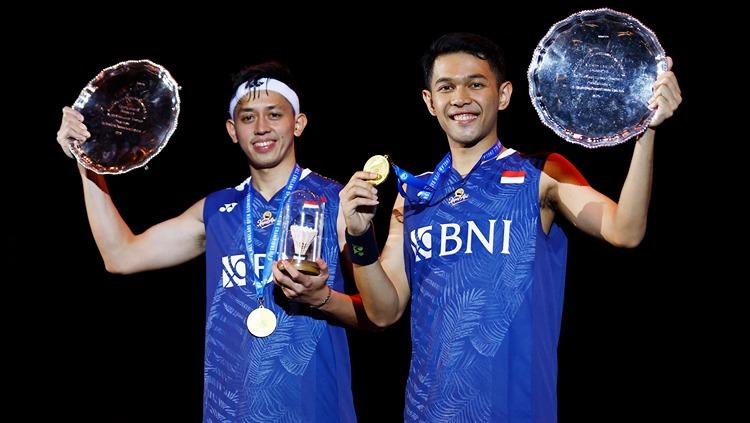 Ganda putra Indonesia, Fajar Alfian/Muhammad Rian Ardianto, semakin menunjukkan kelasnya setelah diajak foto bersama mertua Kevin Sanjaya, Hary Tanoesoedibjo. (Foto: Reuters/Andrew Boyers)