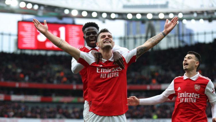 Pemain Swiss, Granit Xhaka, ngotot ingin bertahan di Arsenal demi bermain pada ajang Liga Champions. REUTERS-David Klein - INDOSPORT