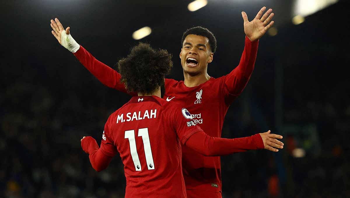 Selebrasi pemain Liverpool Mohamed Salah merayakan gol keempat mereka bersama Cody Gakpo di Liga Inggris antara Leeds United vs Liverpool. (Foto: REUTERS/Molly Darlington) - INDOSPORT