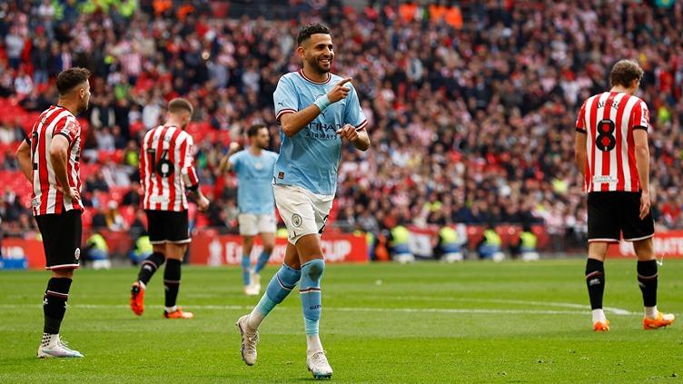 Selebrasi pemain Manchester City, Riyad Mahrez seusai mencetak gol ke gawang Sheffield United di semifinal Piala FA. Reuters/Jason Cairnduff - INDOSPORT