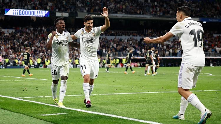 Marco Asensio, Vinicius Junior dan Dani Ceballos melakukan selebrasi di laga Real Madrid vs Celta Vigo. REUTERS/Juan Medina