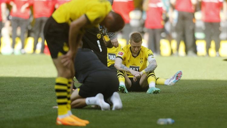 Apesnya bintang Liga Jerman (Bundesliga), Marco Reus (Borussia Dortmund), dan beruntungnya Kingsley Coman (Bayern Munchen) jika berbicara soal trofi. - INDOSPORT