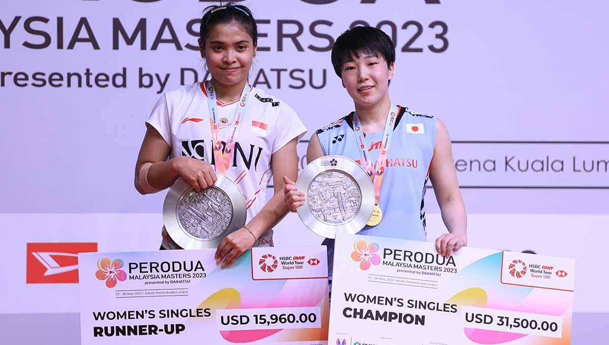 Tunggal putri Indonesia, Gregoria Mariska Tunjung di podium Malaysia Masters 2023. (Foto: PBSI) - INDOSPORT