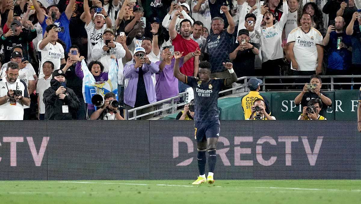 Selebrasi pemain Real Madrid usai Vinicius Junior usai mencetak gol ke gawang AC Milan pada menit 84 pada babak kedua di Pasadena, California, AS, Senin (24/07/23). (Foto: REUTERS/Kirby Lee)