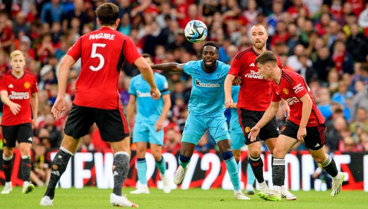 Pemain Manchester United, Christian Eriksen dan Harry Maguire saat pertandingan melawan Athletic Club Bilbao laga persahabatan pramusim. (Foto: athletic-club) Copyright: athletic-club