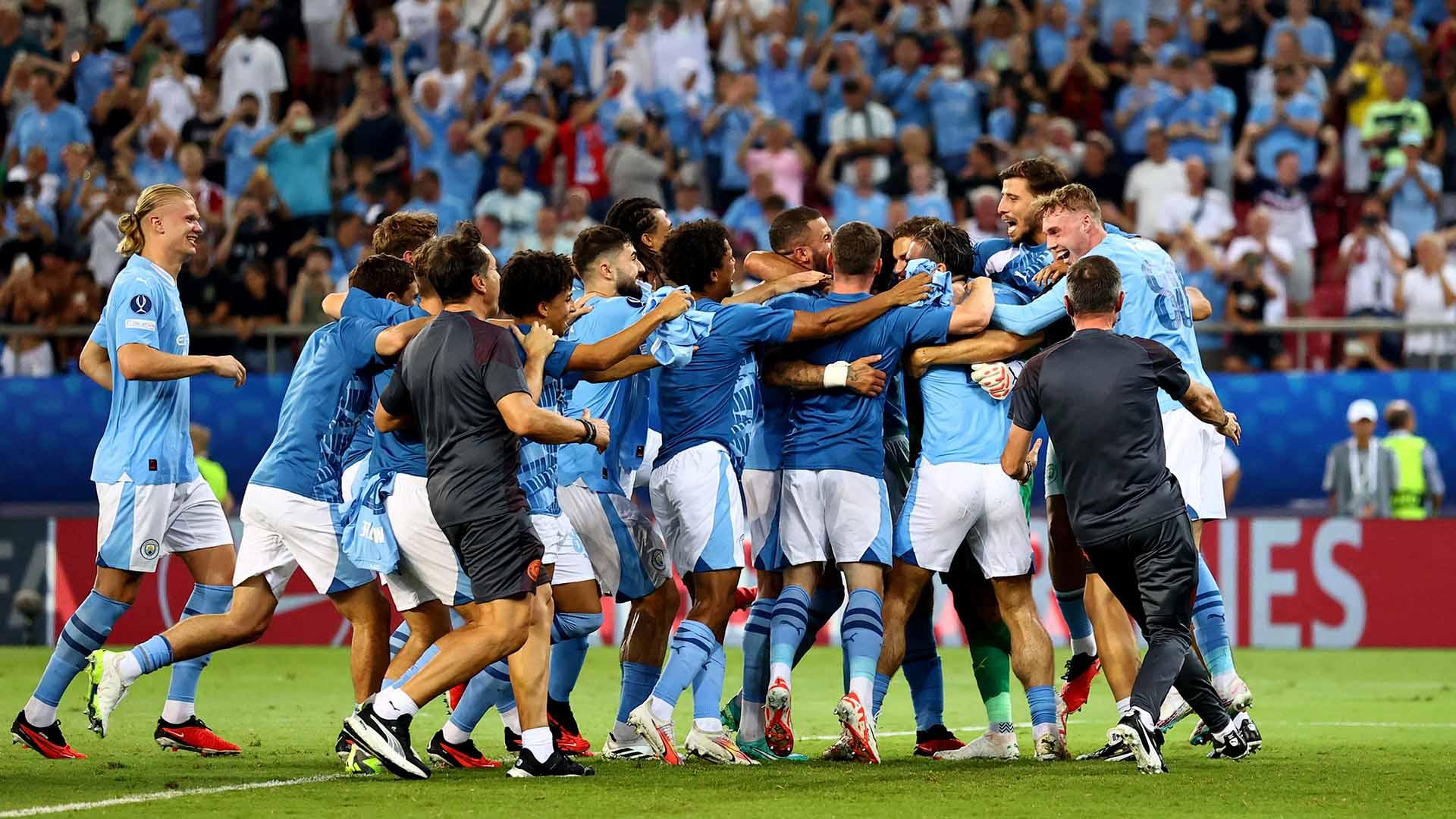 Selebrasi para pemain Manchester City, usai memenangkan pertandingan melawan Sevilla pada laga Piala Super UEFA 2023. (Foto: REUTERS/Stoyan Nenov)