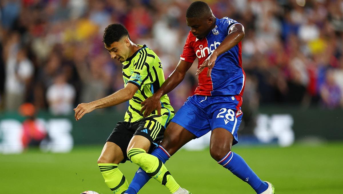 Cheick Doucoure (kanan) masih dikaitkan dengan Liverpool. Foto: Reuters/Andrew Boyers. - INDOSPORT