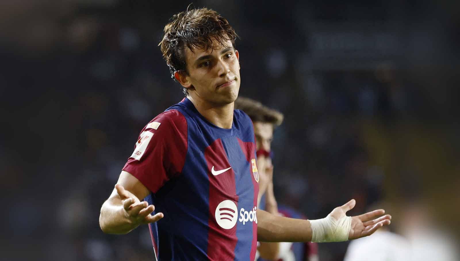 Selebrasi pemain Barcelona Joao Felix usai mencetak gol di laga Barcelona vs Real Betis (17/09/23). (Foto: REUTERS/Albert Gea)