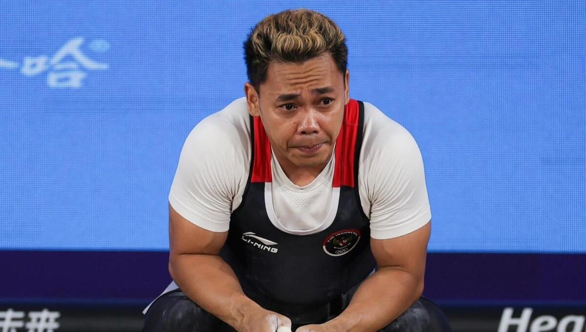 Ekspresi Eko Yuli Irawan saat gagal meraih medali di Asian Games 2022 (Foto: NOC Indonesia/Naif Al'as)