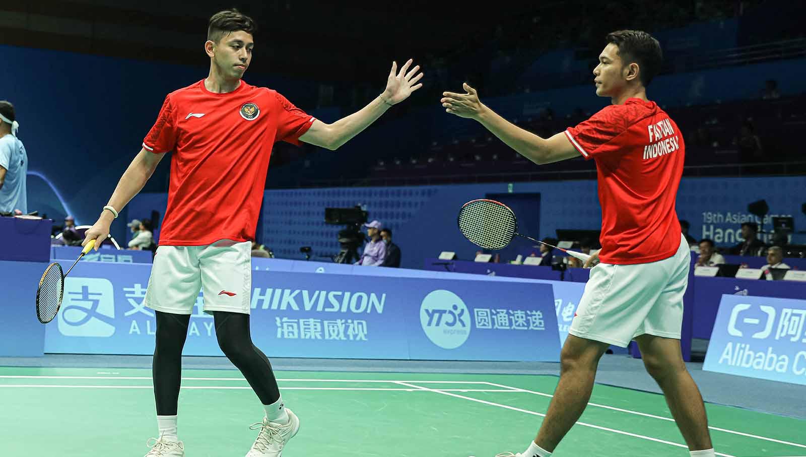 Pasangan ganda putra Indonesia, Fajar Alfian/Muhammad Rian Ardianto di badminton perorangan Asian Games 2022. (Foto: PBSI) - INDOSPORT