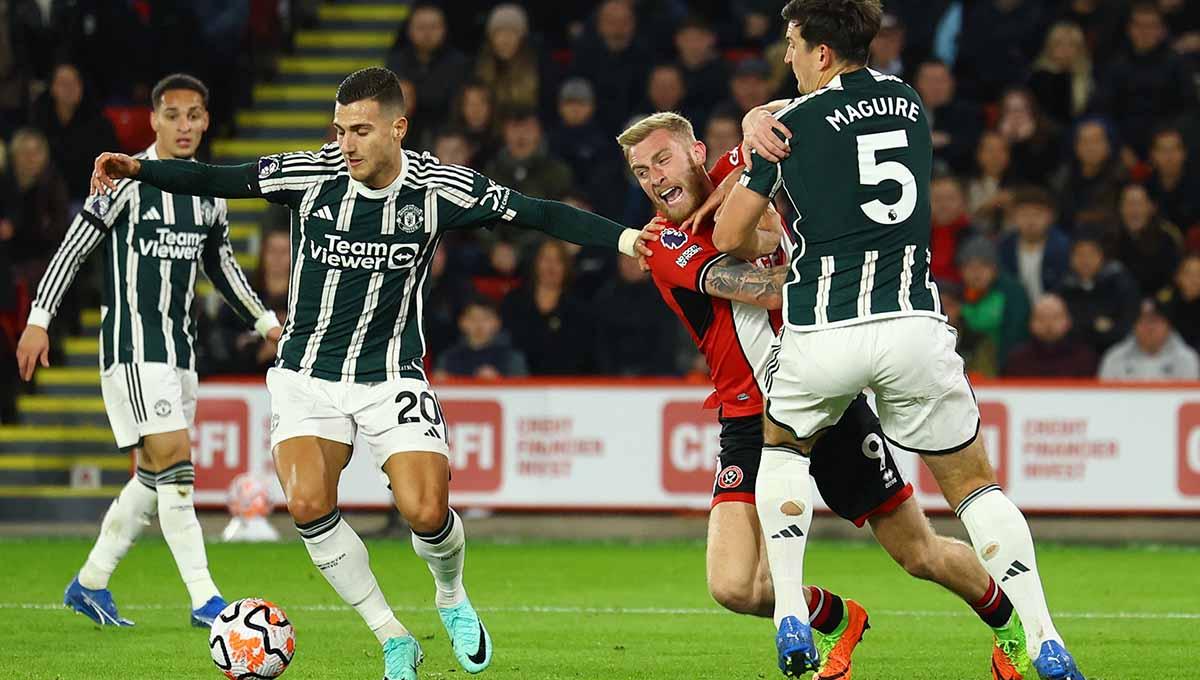 Manchester United punya satu kelemahan fatal meski berhasil mempermalukan Sheffield United semalam. Foto: Reuters/Ed Sykes.
