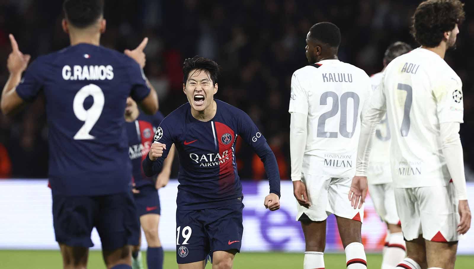 Selebrasi pemain Paris Saint Germain, Lee Kang-in usai mencetak gol ketiga ke gawang AC Milan bersama rekan setim Goncalo Ramospada pada laga Liga Champions di Stadion Parc des Princes, Prancis, Kamis (26/10/23). (Foto: REUTERS/Stephanie Lecocq)