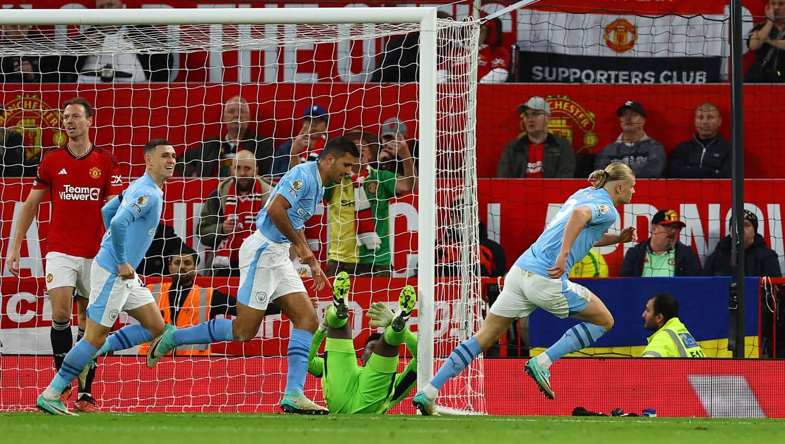 Erling Haaland juga terlihat merayakan gol bersama Rodri dan Phil Foden. Foto: REUTERS/Molly Darlington.