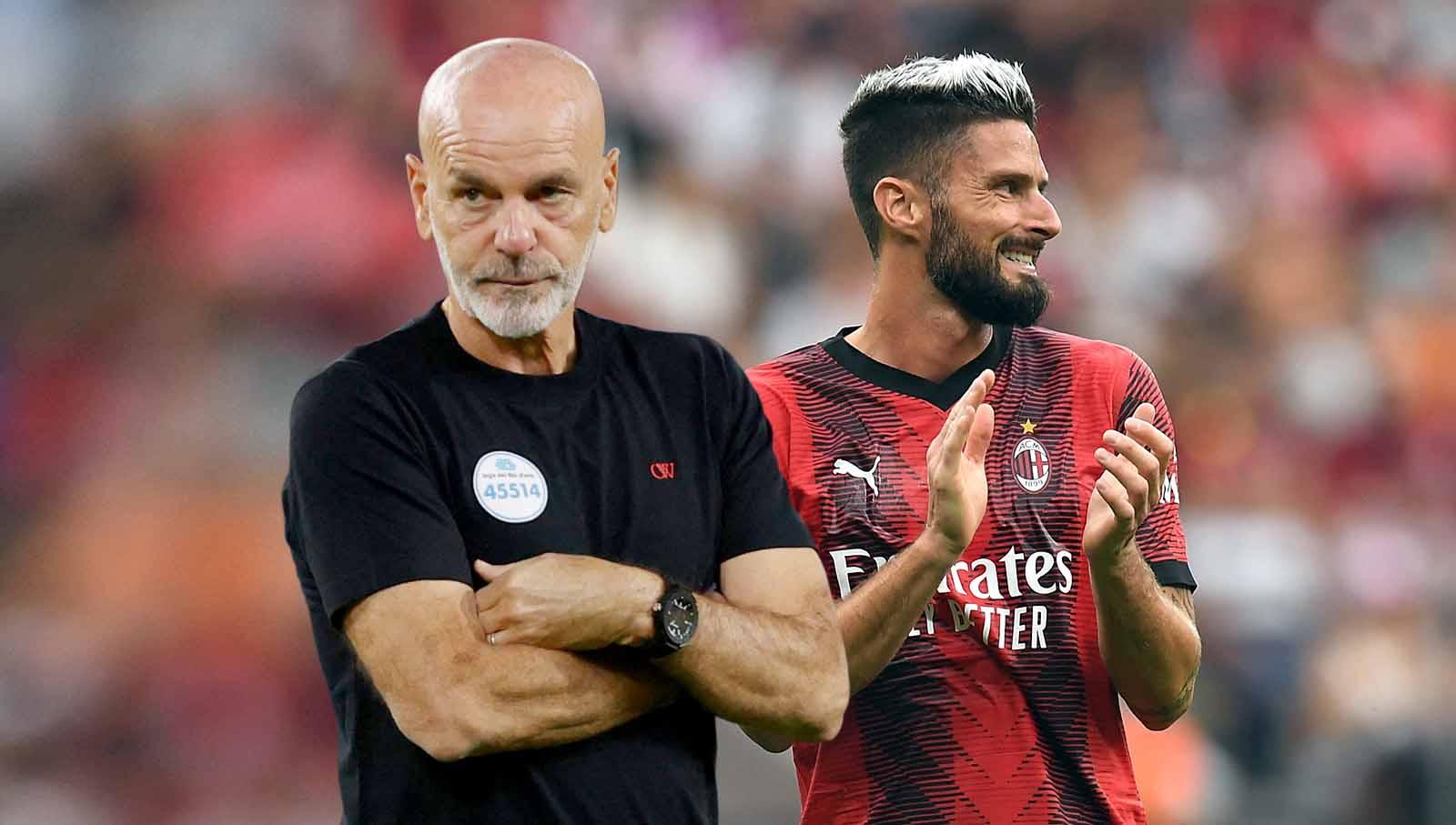 Pelatih Stefano AC Milan, Pioli dan penyerang Olivier Giroud. (Foto: REUTERS/Ciro De Luca/Daniele Mascolo)