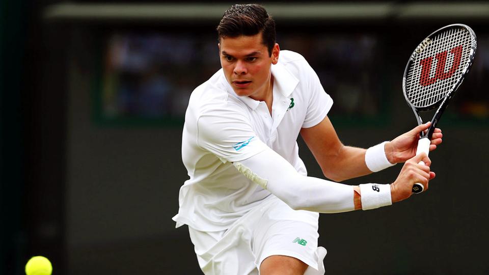 Milos%20Raonic%2C%2025%2C%20saat%20bermain%20di%20Wimbledon.