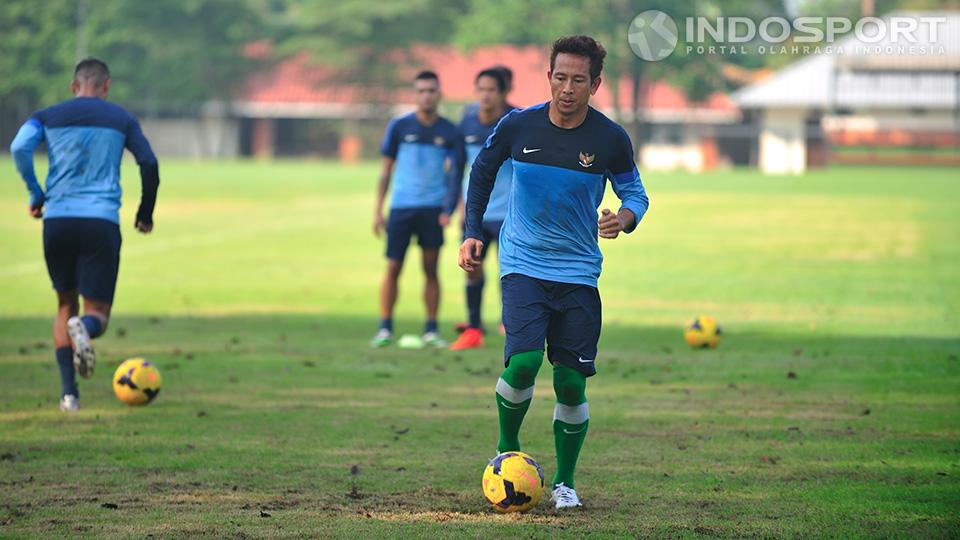 I Made Wirawan pada saat latihan bersama timnas senior di lapangan Sekolah Pelita Harapan, Karawaci, Tangerang. Senin (07/07/14). Copyright: Ratno Prasetyo/Indosport