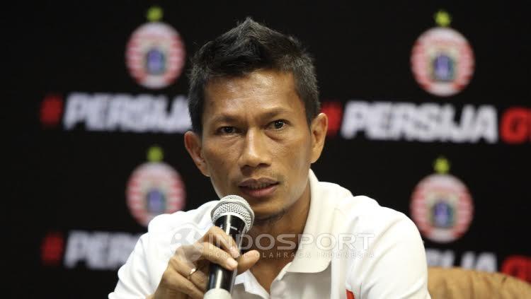 Kapten Persija Jakarta, Ismed Sofyan dalam tengah berbicara saat jumpa pers. Copyright: Herry Ibrahim/INDOSPORT