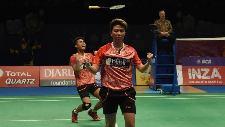 Tontowi Ahmad/Liliyana Natsir merayakan kemenangan di final Indonesia Open 2017. Copyright: Herry Ibrahim/Indosport.com
