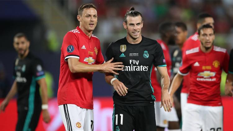 Nemanja Matic (Manchester United) dan Gareth Bale (Real Madrid) di final Piala Super Eropa. Copyright: Press Association (PA)