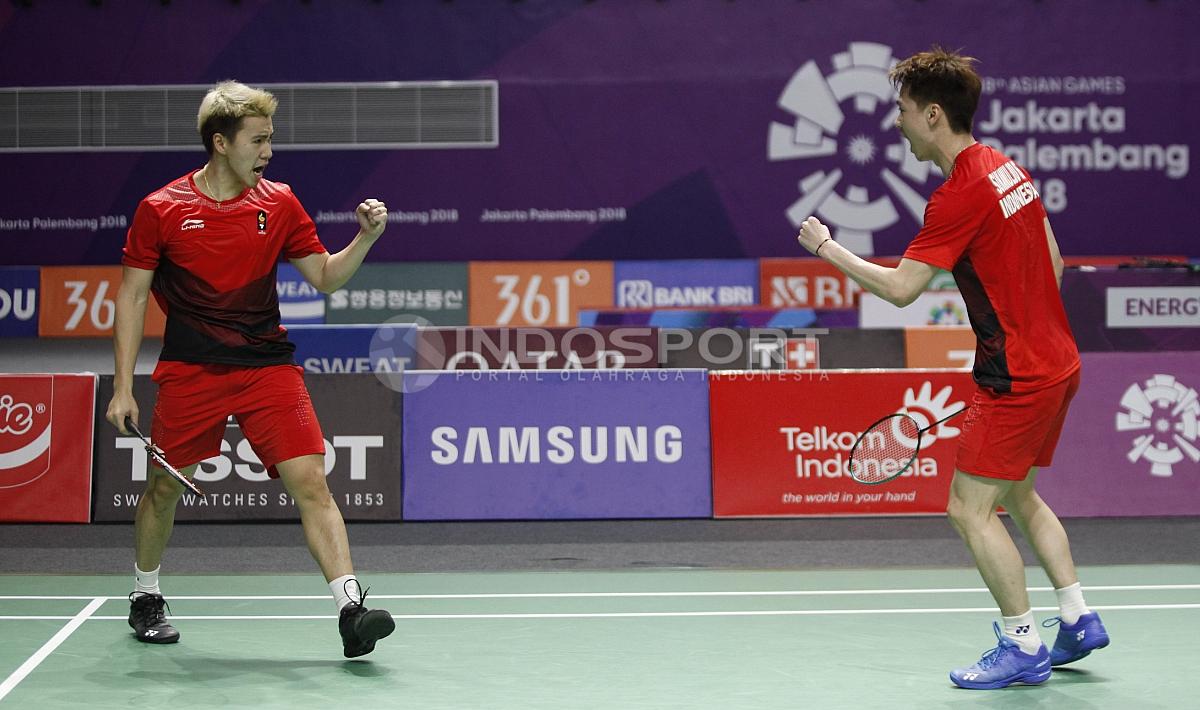 Aksi selebrasi Kevin Sanjaya/Markus Fernaldi Gideon di Asian Games 2018. Copyright: Herry Ibrahim/INDOSPORT