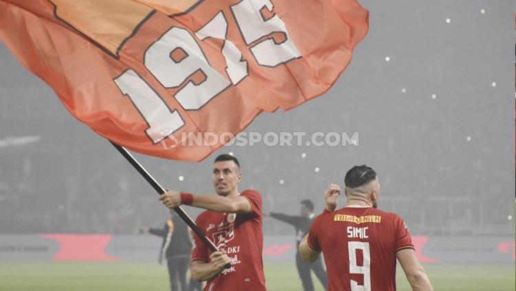 Xandao (kiri) dalam perayaan kemenangan Persija atas Persipura bertepatan di hari ultah klub ke-91. Copyright: Herry Ibrahim/INDOSPORT