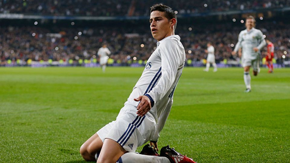 James Rodriguez selebrasi setelah mecetak gol ke gawang Sevilla. Copyright: © Victor Carretero/Real Madrid via Getty Images