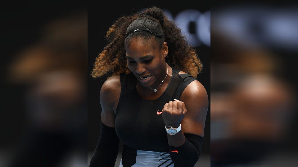 Serena Williams merayakan keberhasilan mengalahkan Belinda Bencic. Copyright: &copy; GREG WOOD/AFP/Getty Images