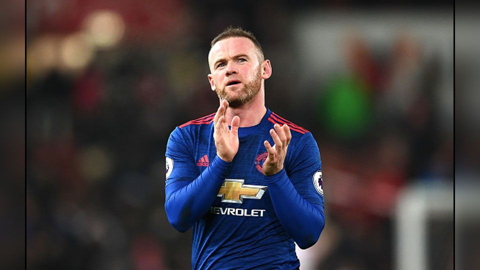 Wayne Rooney, striker dan kapten Man United. Copyright: © Getty Images
