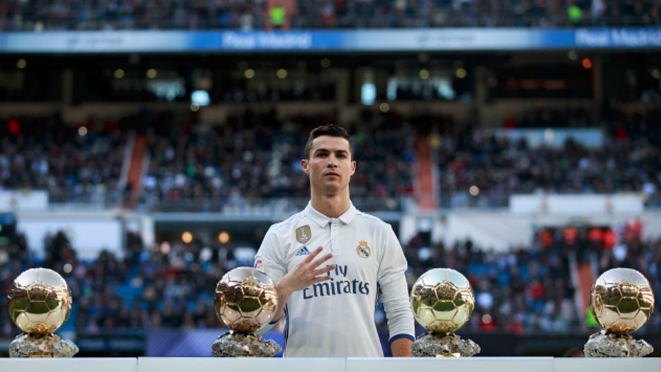 Cristiano Ronaldo dan empat penghargaan Ballon d'Or. Copyright: © Getty Images