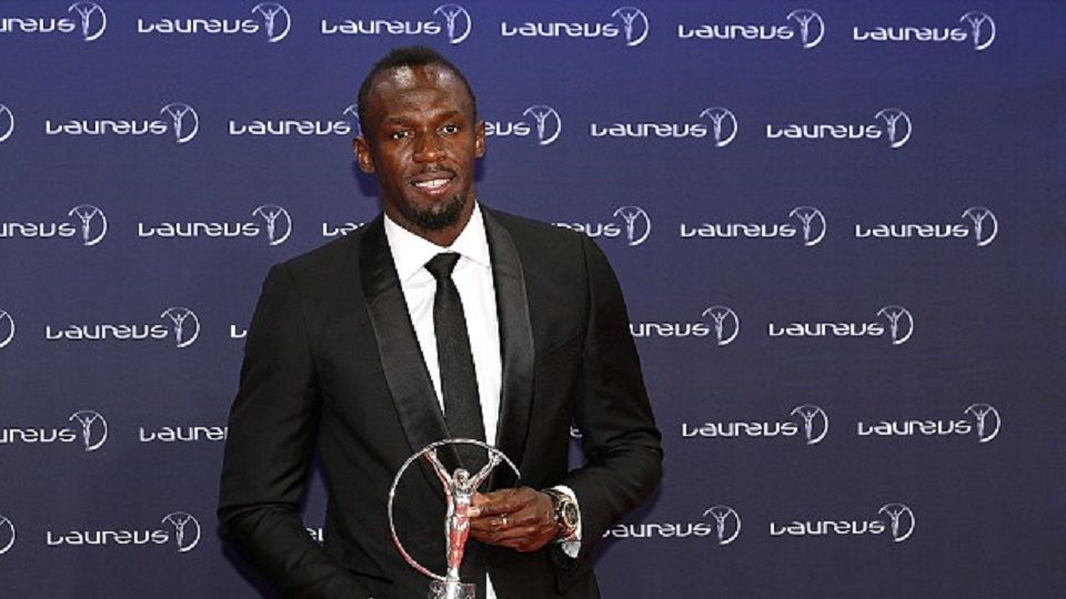Usain Bolt saat menerima penghargaan atlet terbaik tahun ini dari Laureus Award. Copyright: &copy; EPA