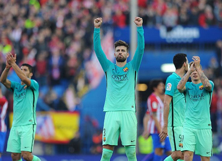 Para pemain Barcelona merayakan kemenangan atas Atletico Madrid. Copyright: © Getty Images
