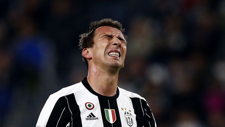 Penyerang Juventus, Mario Mandzukic. Copyright: © MARCO BERTORELLO/AFP/Getty Images