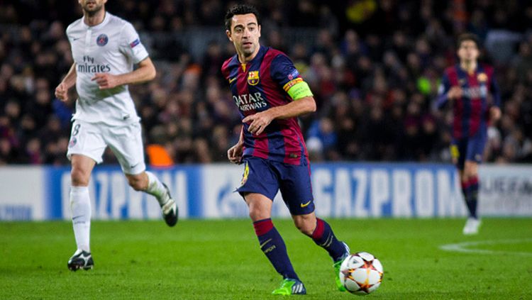 Gelandang legendaris Xavi Hernandez saat berseragam Barcelona di LaLiga Spanyol. Copyright: © Albert Llop/Anadolu Agency/Getty Images