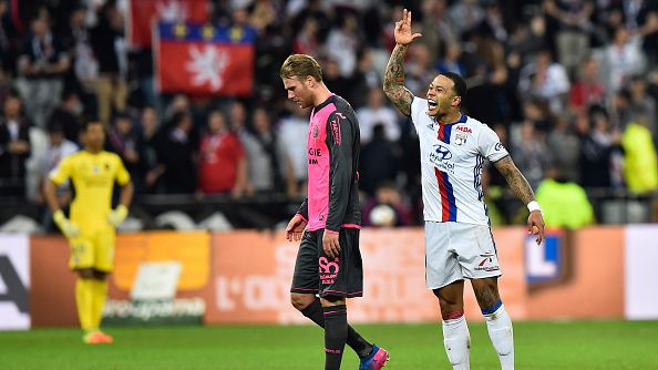 Memphis Depay merayakan golnya ke gawang Toulouse FC. Copyright: © ROMAIN LAFABREGUE/Getty Images