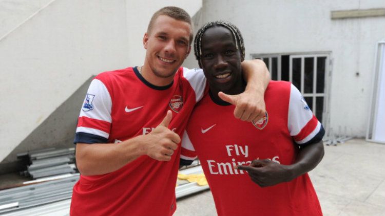 Bacary Sagna dan Lukas Podolski kala masih berseragam Arsenal. Copyright: © David Price/Arsenal FC via Getty Images
