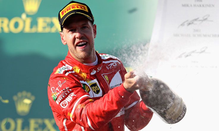 Pembalap Ferrari, Sebastian Vettel merayakan kemenangan di GP Australia. Copyright: © Mark Thompson/Getty Images