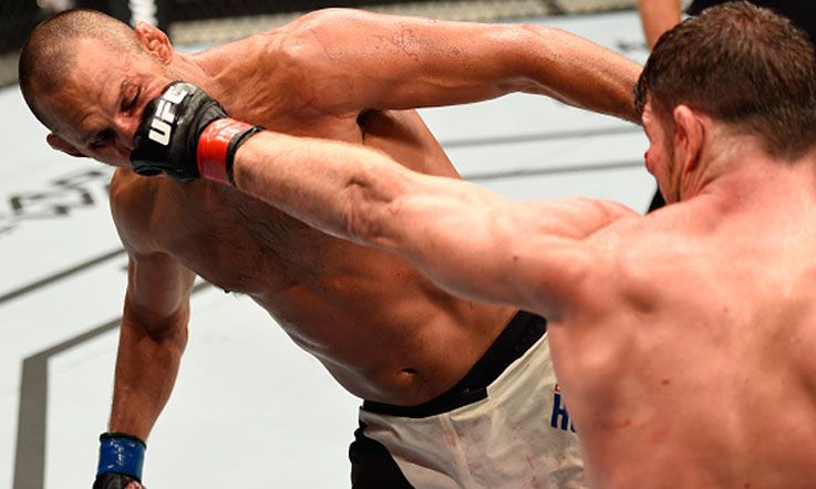 Duel antara Dan Henderson melawan Michael Bisping. Copyright: © Josh Hedges/Zuffa LLC/Zuffa LLC via Getty Images)