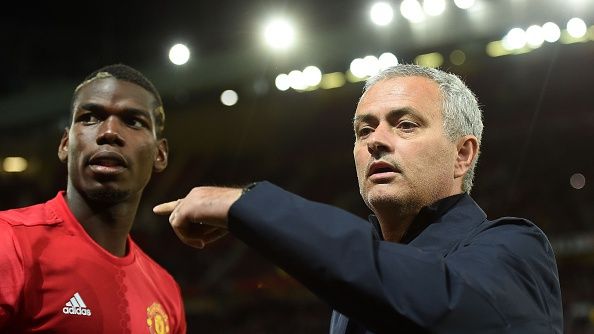 Pogba dan Mourinho. Copyright: © PAUL ELLIS / Staff / Getty Images