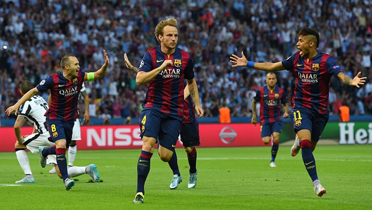 Ivan Rakitic rayakan keberhasilan usai cetak gol. Copyright: © Shaun Botterill/Getty Images