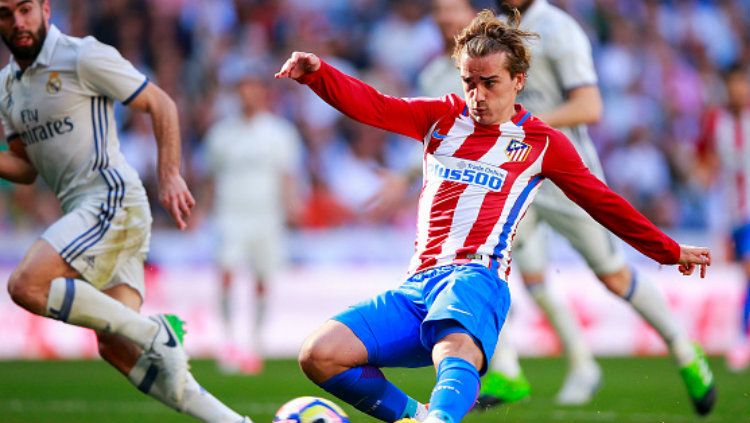 Antoin Griezmann kala membobol gawang Real Madrid di akhir-akhir laga. Copyright: &copy; Gonzalo Arroyo Moreno/Getty Images