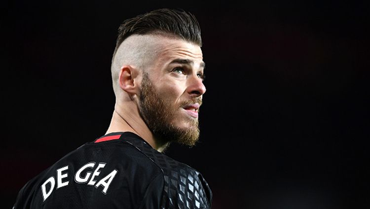 Klub Liga Inggris (Premier League) Manchester United dilaporkan bakal pisah jalan dengan David de Gea per akhir musim ini. Copyright: © Shaun Botterill/Getty Images