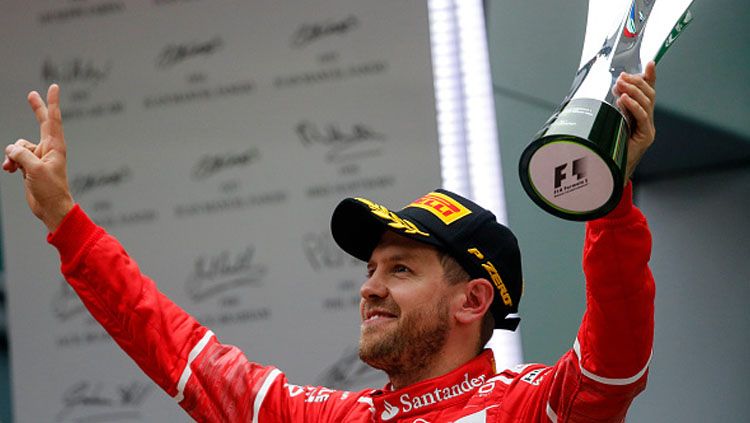 Sebastian Vettel selebrasi di atas podium. Copyright: © Marco Canoniero/LightRocket via Getty Images