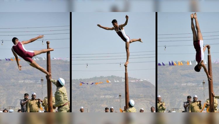 Mallakhamb sebuah olahraga yang mencampurkan yoga dengan senam atletik. Copyright: © sports.vice.com