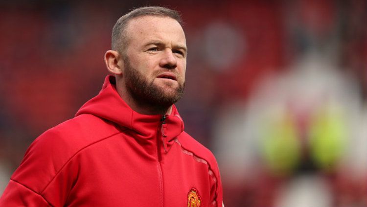 Kesibukan baru sebagai pelatih sepakbola di Amerika Serikat tidak membuat legenda Manchester United, Wayne Rooney, kehilangan atensi. Copyright: © Matthew Ashton - AMA/Getty Images